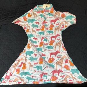 Zipadee-Zip swaddle transition blanket in the "Zoo Print" pattern.